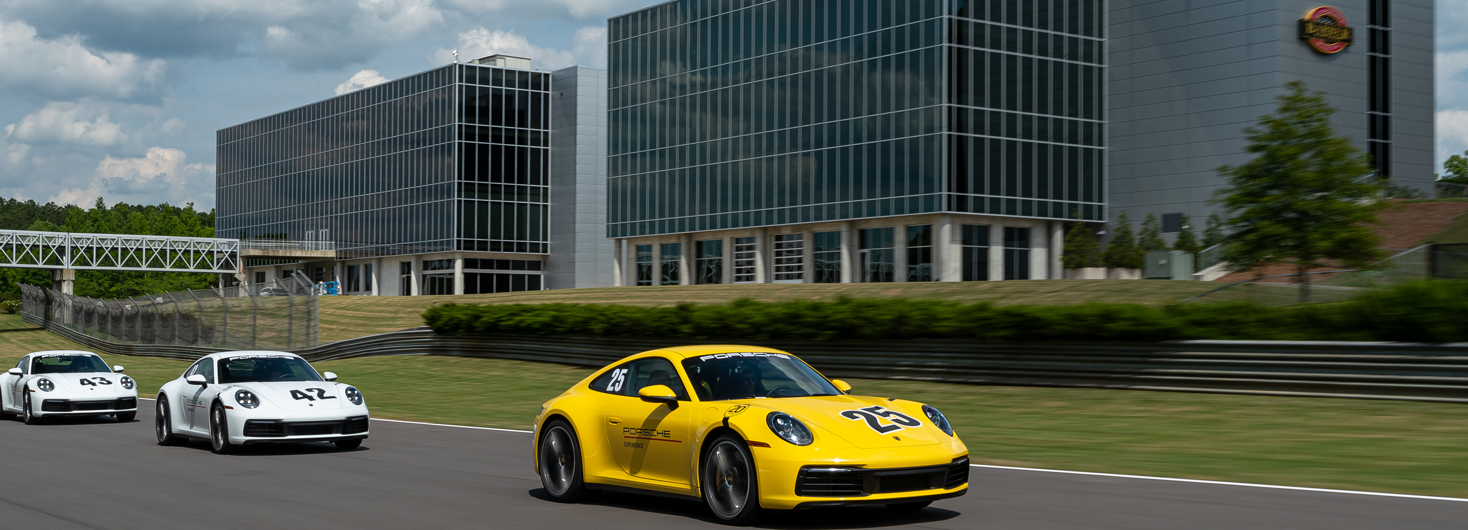 Courses Overview Header image - White Porsche on track